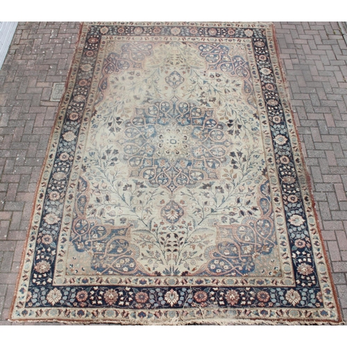 225 - A large vintage Perisan rug, believed to be a Tabriz, blue ground with dark blue border, 380cm x 274... 