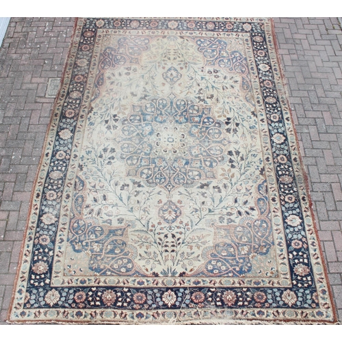 225 - A large vintage Perisan rug, believed to be a Tabriz, blue ground with dark blue border, 380cm x 274... 