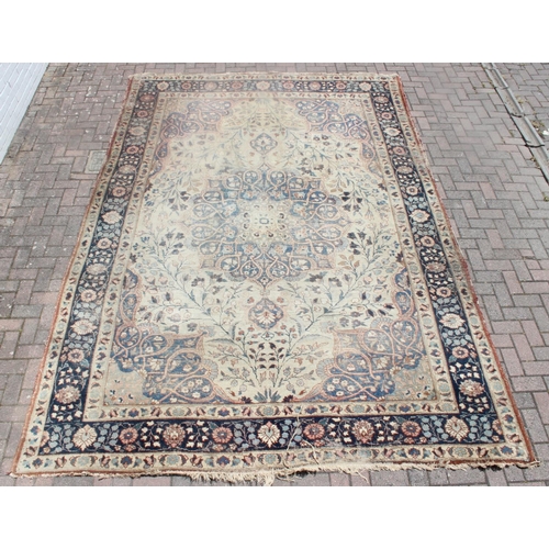 225 - A large vintage Perisan rug, believed to be a Tabriz, blue ground with dark blue border, 380cm x 274... 