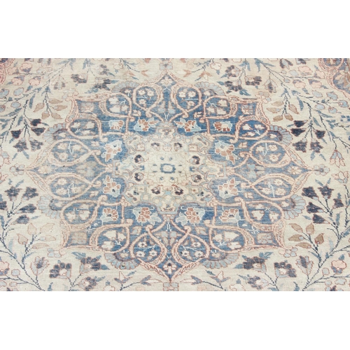 225 - A large vintage Perisan rug, believed to be a Tabriz, blue ground with dark blue border, 380cm x 274... 