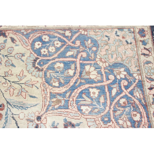 225 - A large vintage Perisan rug, believed to be a Tabriz, blue ground with dark blue border, 380cm x 274... 