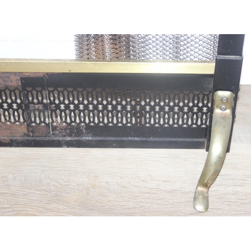 299B - An unusual antique style brass fire screen with metal chain-mail mesh drapery on pulley system, 97cm... 