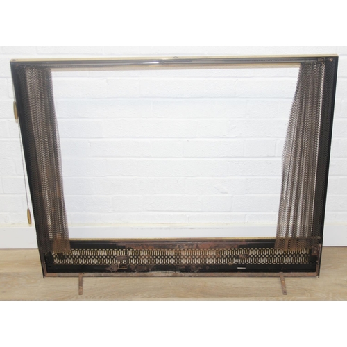 299B - An unusual antique style brass fire screen with metal chain-mail mesh drapery on pulley system, 97cm... 