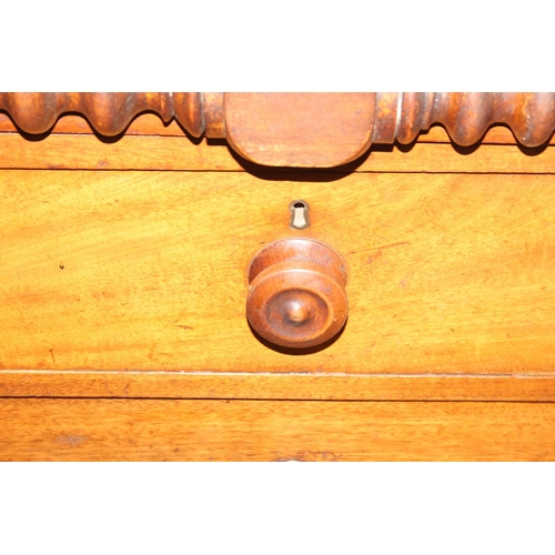 31 - A Victorian mahogany chest of drawers with decorative turned adornments, two over three, 128cm x 48c... 