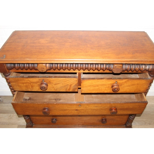 31 - A Victorian mahogany chest of drawers with decorative turned adornments, two over three, 128cm x 48c... 