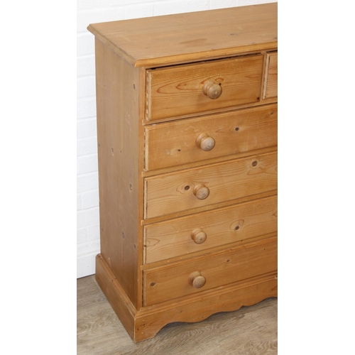 50 - A modern pine two over four chest of drawers with bun handles, 90cm x 40cm x 103cm, one of two in th... 