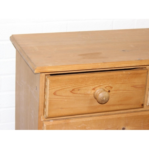 50 - A modern pine two over four chest of drawers with bun handles, 90cm x 40cm x 103cm, one of two in th... 