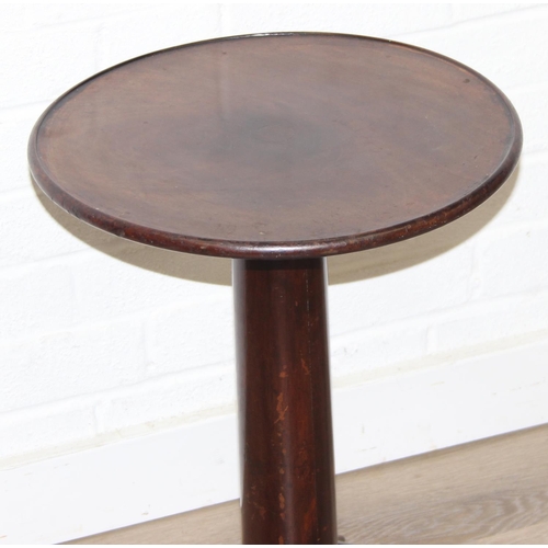197 - A small vintage mahogany side table or jardinière stand with rounded top and pillar support, 39cm in... 