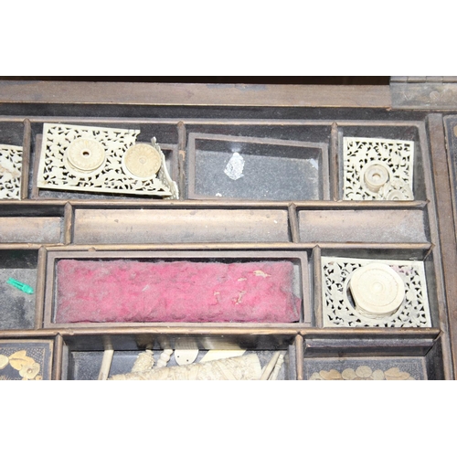 32 - A 19th century Chinese export lacquer work table or sewing table, the top with rounded corners, deco... 