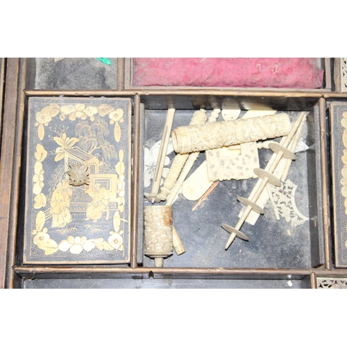 32 - A 19th century Chinese export lacquer work table or sewing table, the top with rounded corners, deco... 