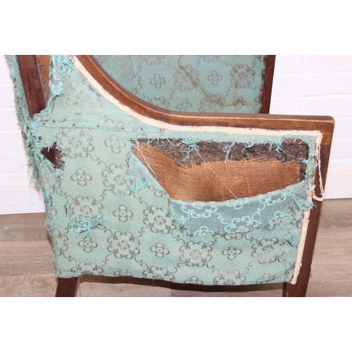 199 - A Regency style turquoise green patterned sofa and armchair with exposed mahogany frame and brass ca... 