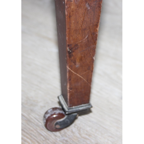 199 - A Regency style turquoise green patterned sofa and armchair with exposed mahogany frame and brass ca... 