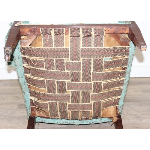 199 - A Regency style turquoise green patterned sofa and armchair with exposed mahogany frame and brass ca... 