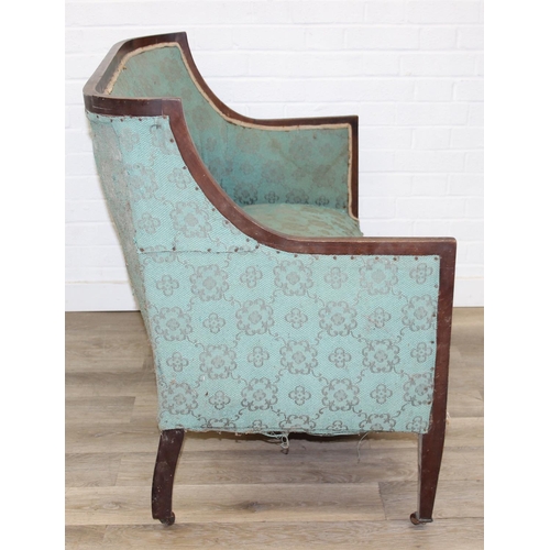 199 - A Regency style turquoise green patterned sofa and armchair with exposed mahogany frame and brass ca... 