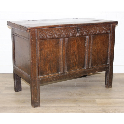 195 - An antique oak coffer with carved details and candle box to interior, likely 18th century, unusual s... 