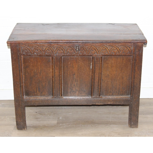 195 - An antique oak coffer with carved details and candle box to interior, likely 18th century, unusual s... 