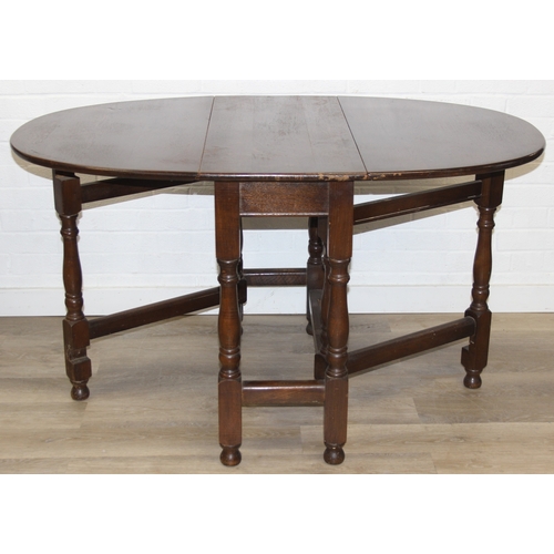 82 - A 17th century style Oak gate-leg table with turned legs, 92cm x 41cm (137cm when open) x 77cm