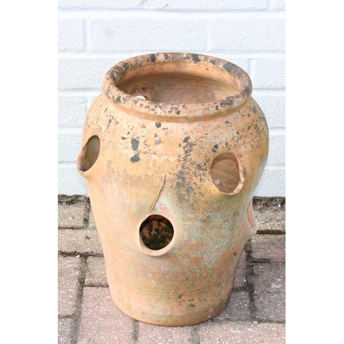 306 - A vintage weathered terracotta garden strawberry planter, 42cm tall, one of four available in the sa... 