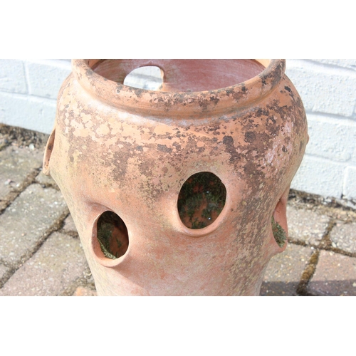 307 - A vintage weathered terracotta garden strawberry planter, 42cm tall, one of four available in the sa... 