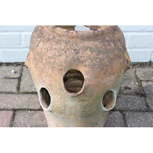 308 - A vintage weathered terracotta garden strawberry planter, 42cm tall, one of four available in the sa... 