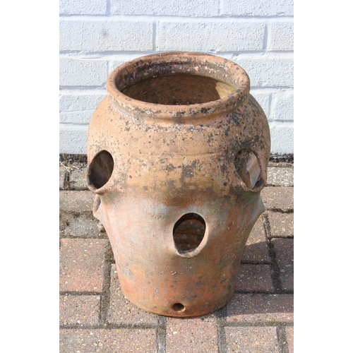 309 - A vintage weathered terracotta garden strawberry planter, 42cm tall, one of four available in the sa... 