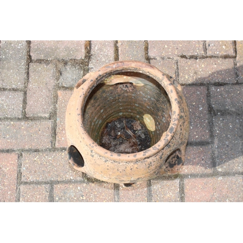 309 - A vintage weathered terracotta garden strawberry planter, 42cm tall, one of four available in the sa... 