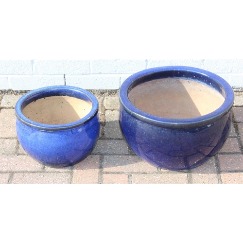 311 - Two blue glazed garden planters or pots, the largest 40cm in diameter x 23cm tall [2]