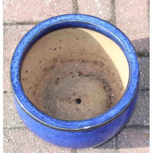311 - Two blue glazed garden planters or pots, the largest 40cm in diameter x 23cm tall [2]