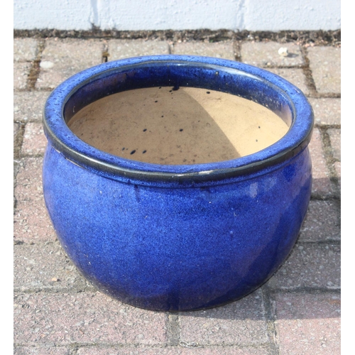 311 - Two blue glazed garden planters or pots, the largest 40cm in diameter x 23cm tall [2]