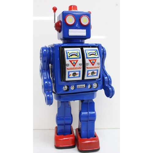 687 - Retro toy robot Space Walk Man, battery operated  with original box, the box measures 17cm x 13cm x ... 