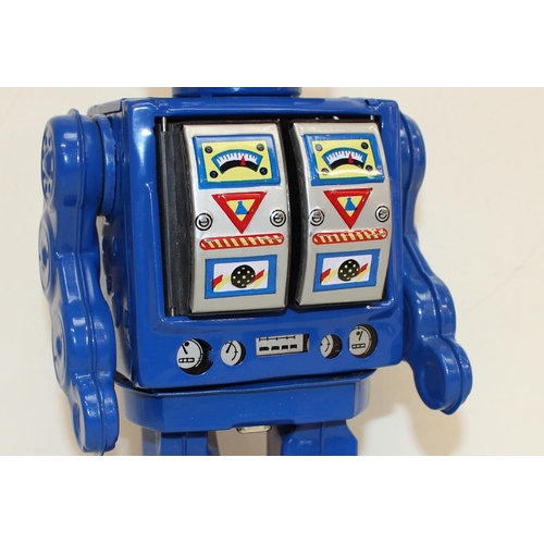 687 - Retro toy robot Space Walk Man, battery operated  with original box, the box measures 17cm x 13cm x ... 