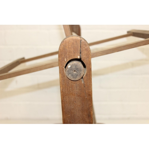 299 - Vintage spinning wheel painted in a barge ware style, and antique wool winder in pine, the wool wind... 