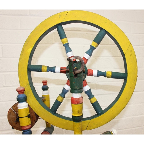 299 - Vintage spinning wheel painted in a barge ware style, and antique wool winder in pine, the wool wind... 