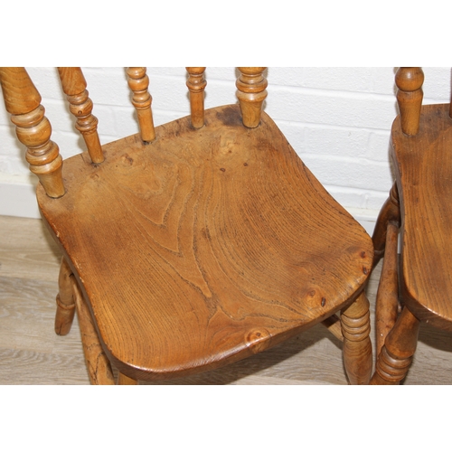 67 - A set of five antique farmhouse kitchen chairs with elm seats, turned spindle backs, each 89cm tall ... 