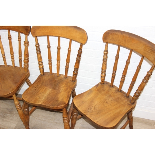 67 - A set of five antique farmhouse kitchen chairs with elm seats, turned spindle backs, each 89cm tall ... 