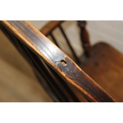 108 - An antique farmhouse stick-back Windsor armchair with elm seat, 19th century, 56cm wide x 113cm tall