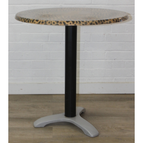 105 - An unusual bistro table with metal base, the table top with cheetah print design, the top by SM Fran... 