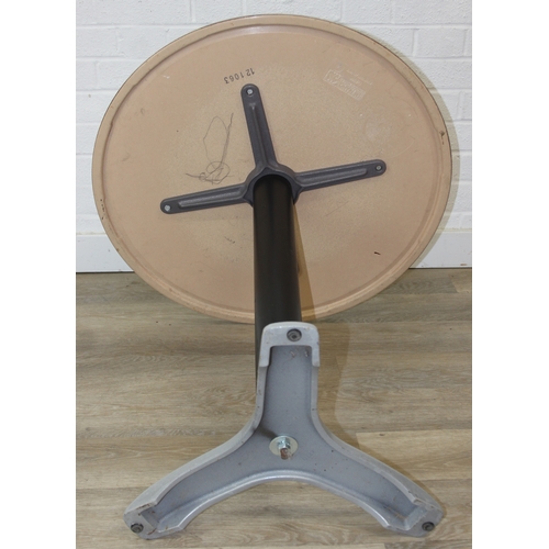 105 - An unusual bistro table with metal base, the table top with cheetah print design, the top by SM Fran... 