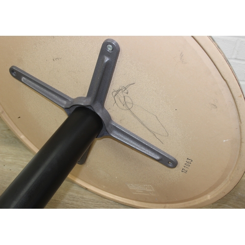 105 - An unusual bistro table with metal base, the table top with cheetah print design, the top by SM Fran... 