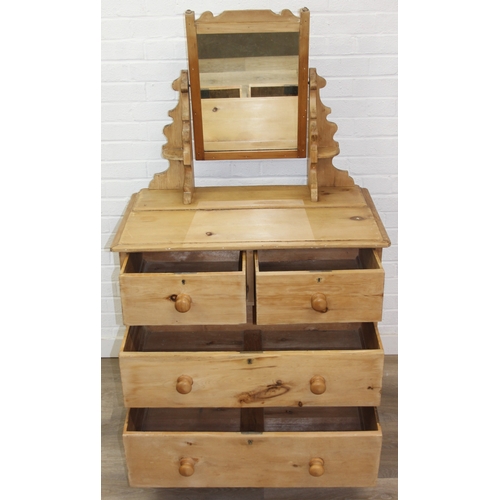 71 - A Victorian pine dressing chest with mirror top and two over two drawers to base, 88cm x 51cm x 152c... 