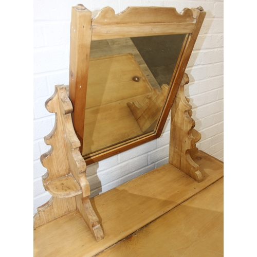 71 - A Victorian pine dressing chest with mirror top and two over two drawers to base, 88cm x 51cm x 152c... 