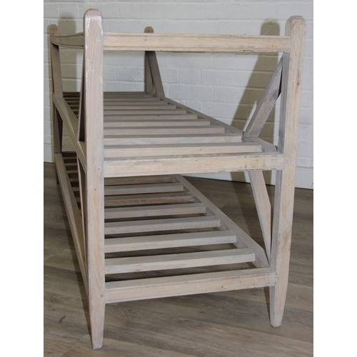 114 - A modern limed light oak side table with three tiers, a solid top tier and two slatted tiers under, ... 