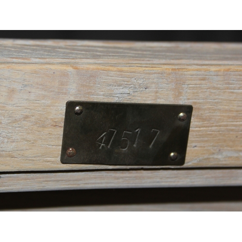 114 - A modern limed light oak side table with three tiers, a solid top tier and two slatted tiers under, ... 