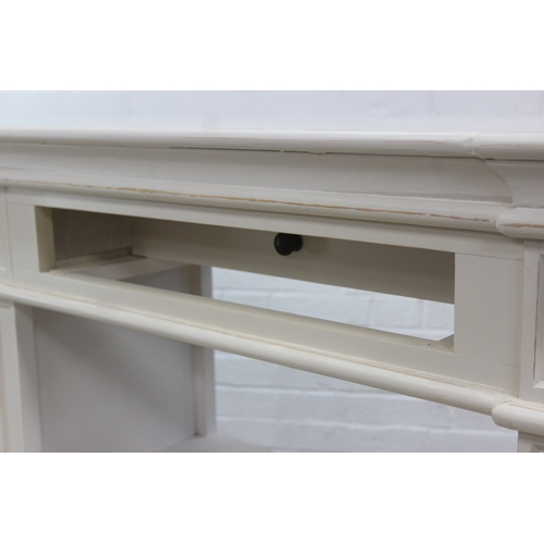 90 - A good quality modern white console table or sideboard with two drawers and open shelves, believed t... 