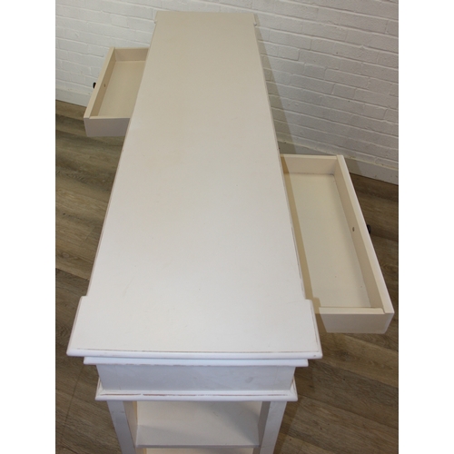90 - A good quality modern white console table or sideboard with two drawers and open shelves, believed t... 