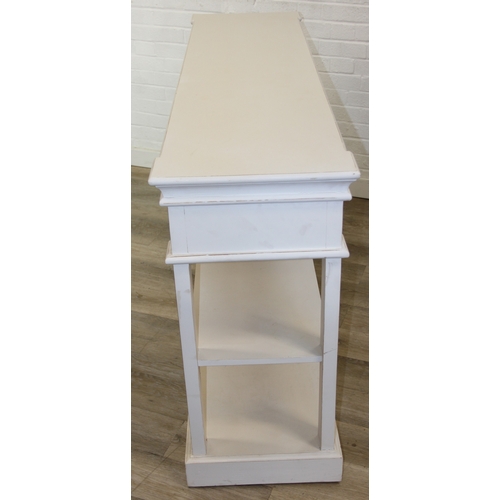 90 - A good quality modern white console table or sideboard with two drawers and open shelves, believed t... 