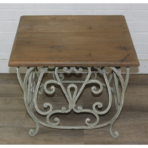 111 - A vintage wooden topped low table with distressed painted wrought iron base, 59cm x 59cm x 61cm