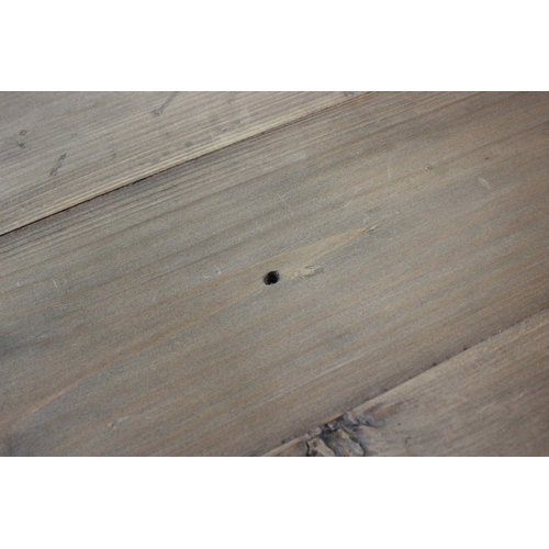 111 - A vintage wooden topped low table with distressed painted wrought iron base, 59cm x 59cm x 61cm