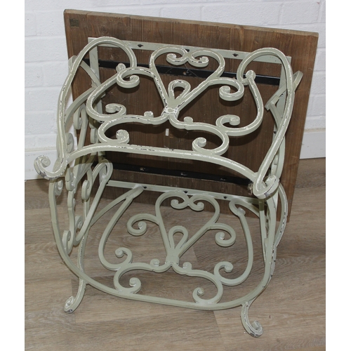 111 - A vintage wooden topped low table with distressed painted wrought iron base, 59cm x 59cm x 61cm