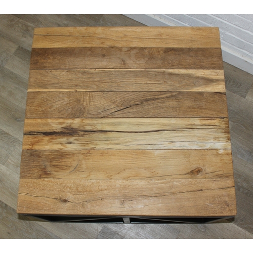 76 - A good quality reclaimed wooden topped side table with wrought metal industrial style bases, 75cm x ... 